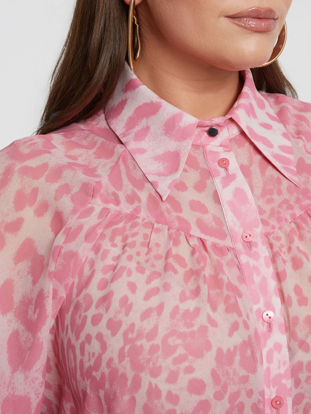 Ruffled button-up shirt in animal print