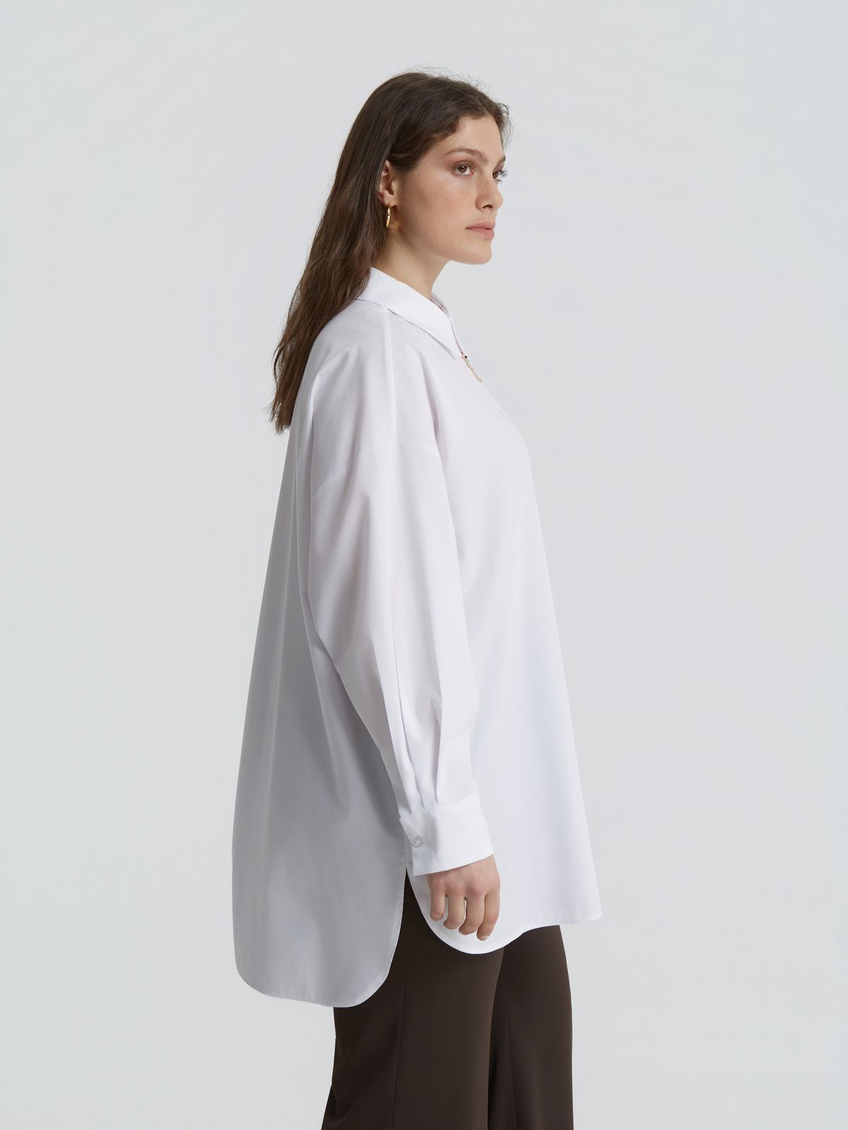 White shirt with decorative chain detail