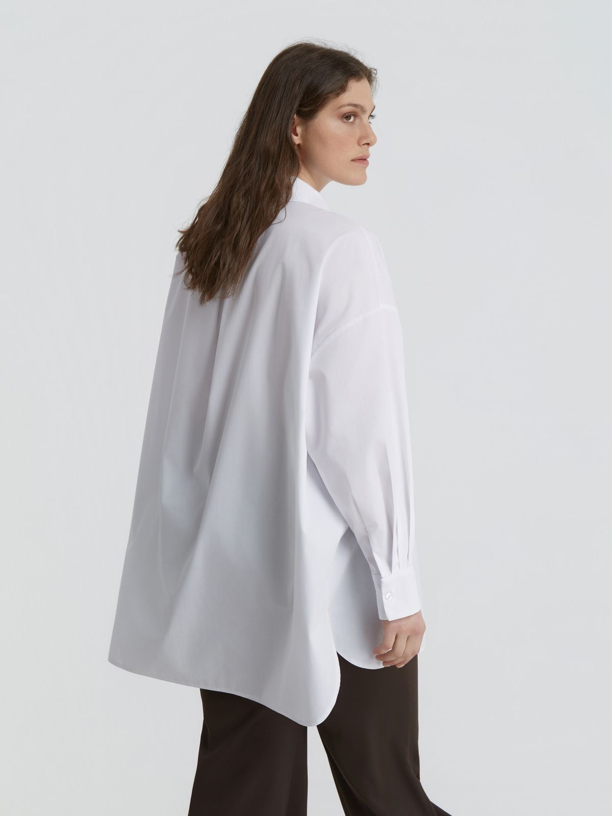 White shirt with decorative chain detail