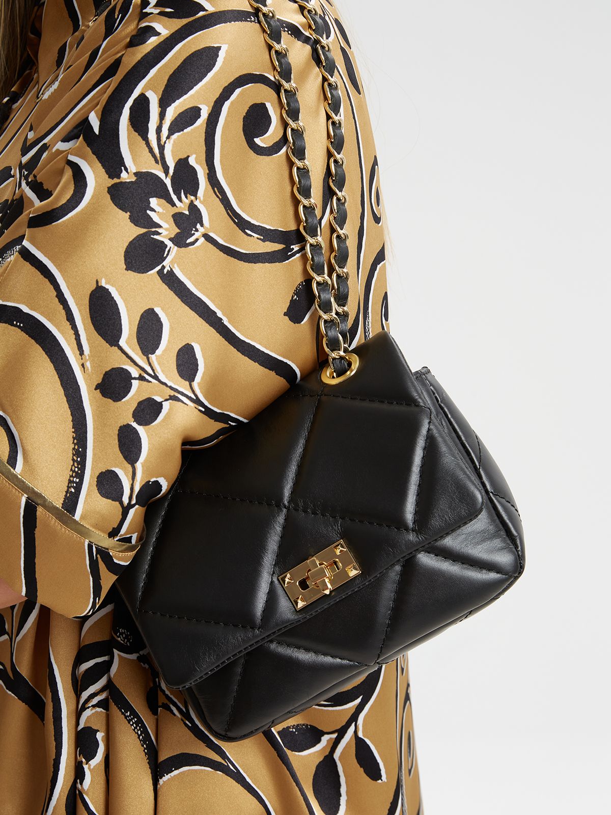 Quilted leather mini flap bag