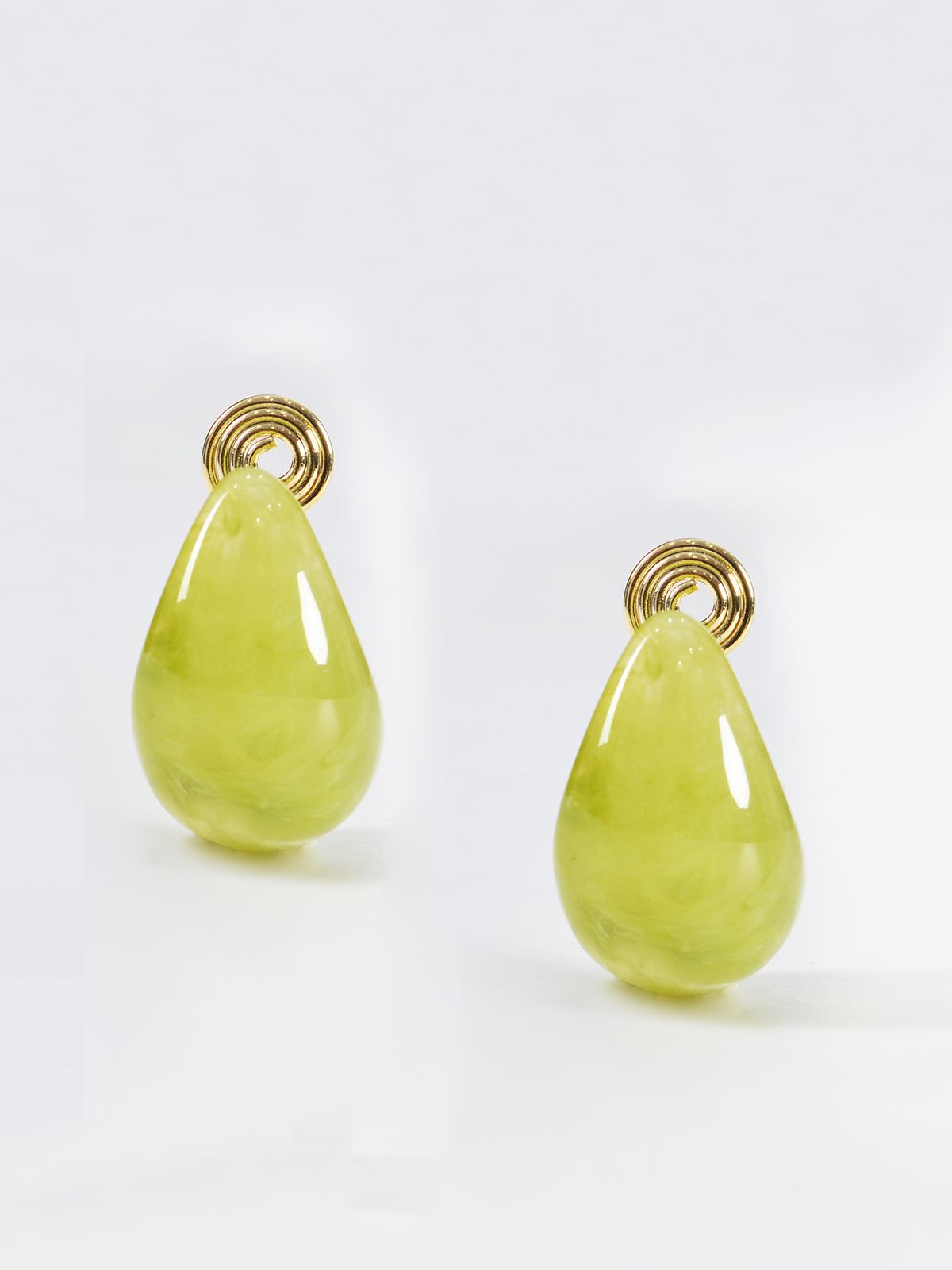 Clip-on resin earrings with spiral detail 