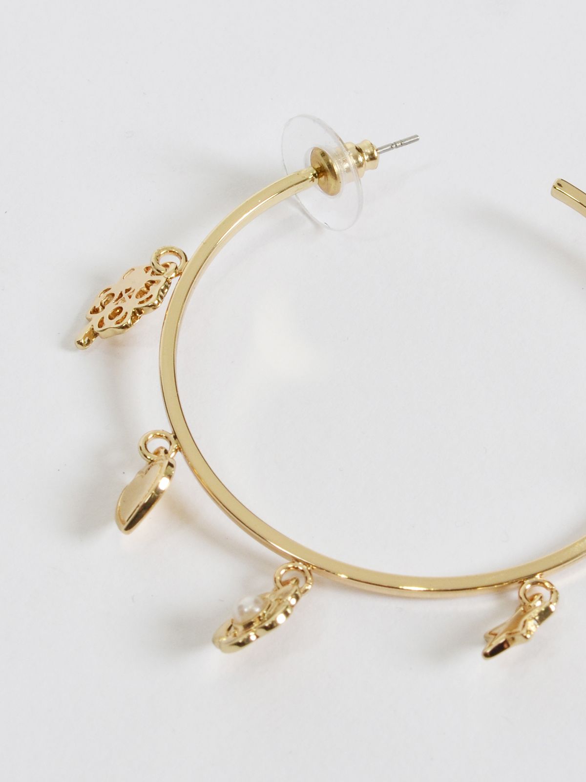 Gold-tone hoop earrings with heart charms and pearl accents