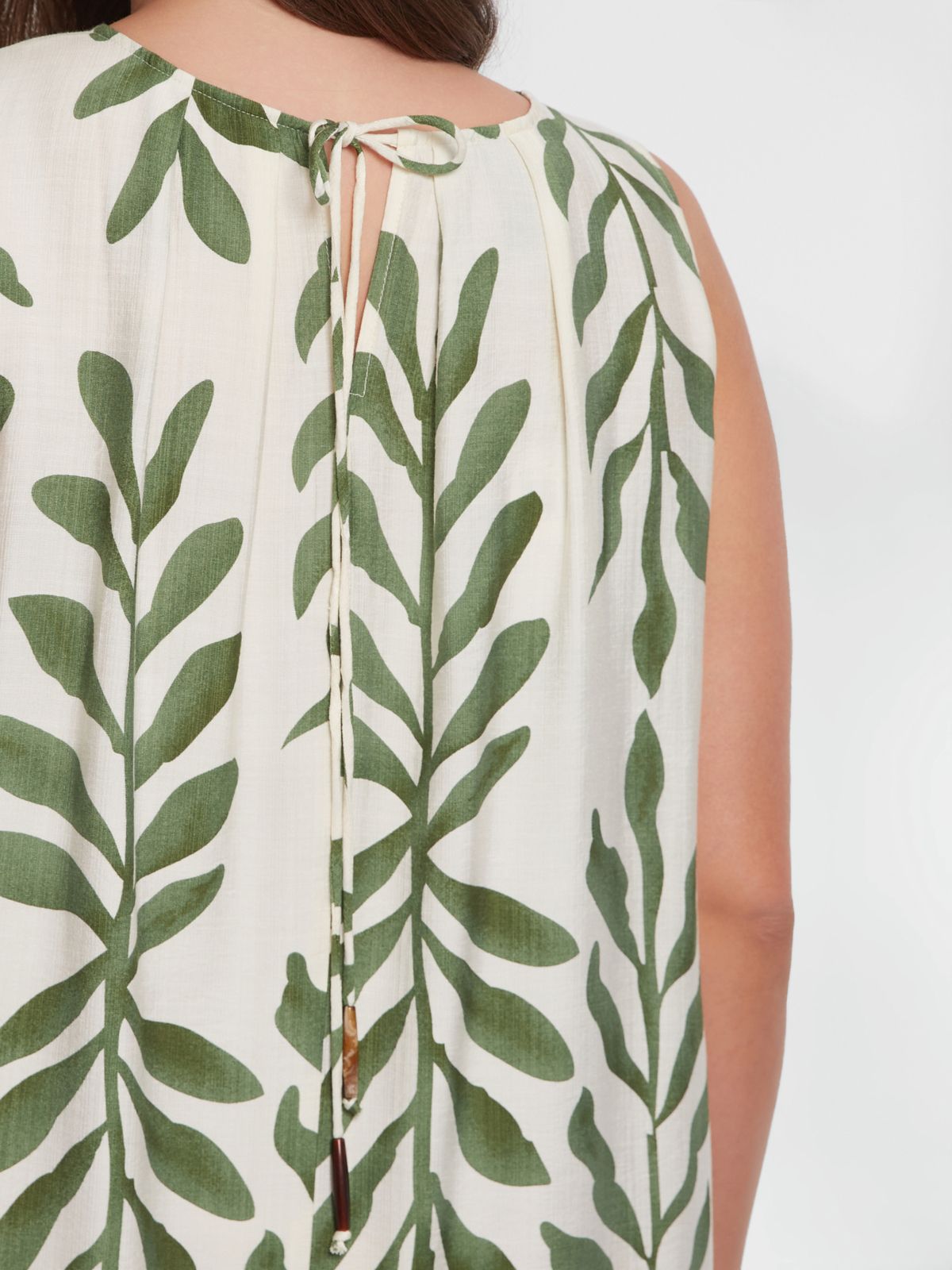 Sleeveless A-line midi dress in botanical print