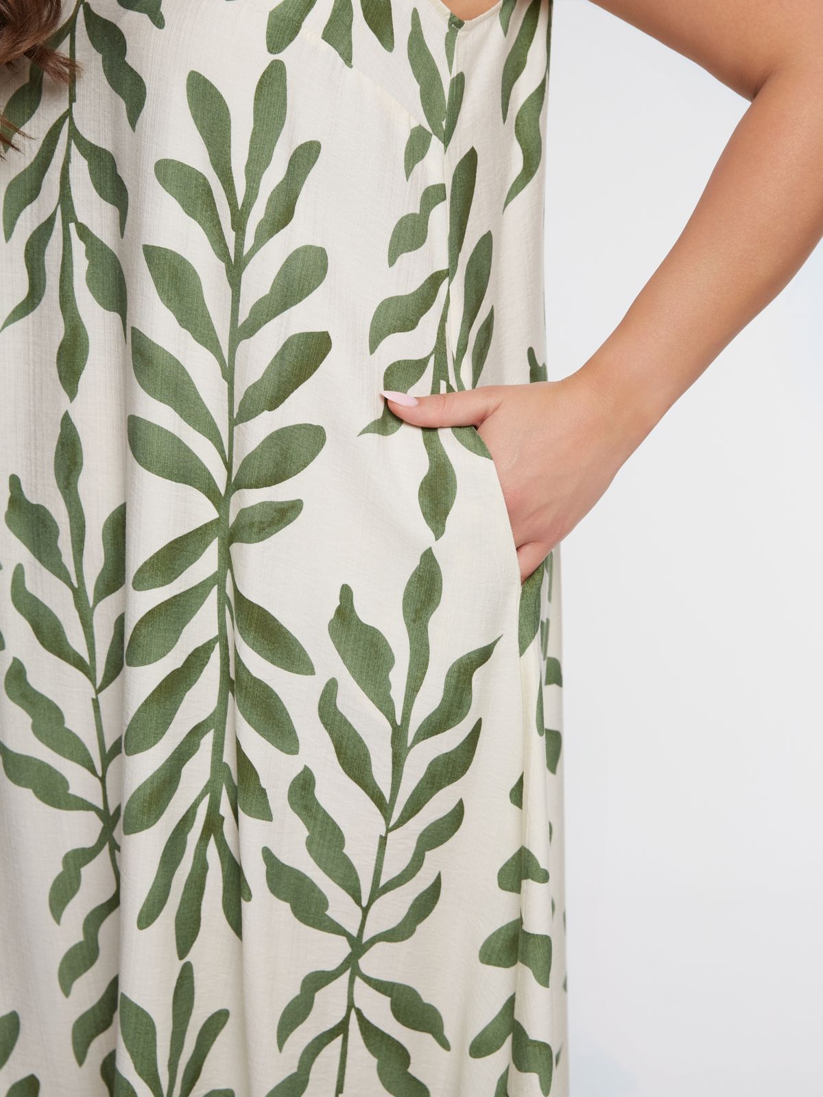 Sleeveless A-line midi dress in botanical print