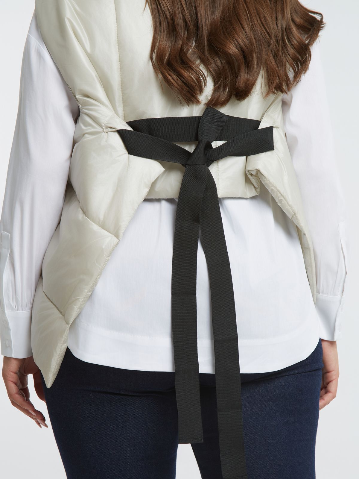 Sleeveless wrap puffer vest with belt