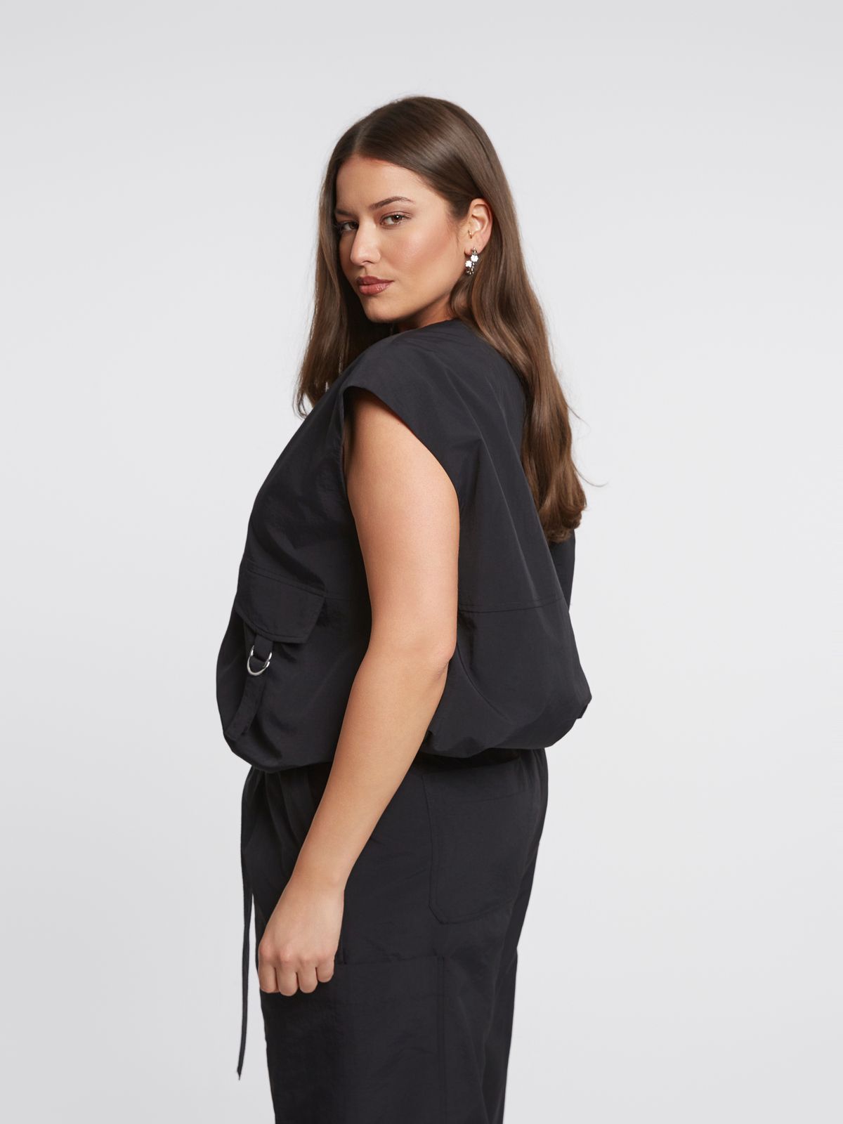 Technical zip-up vest with utility pocket details