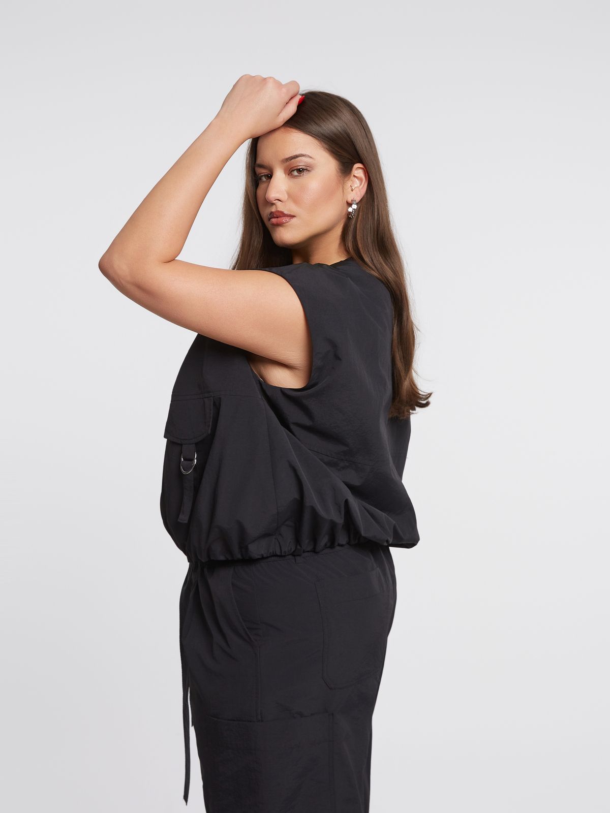 Technical zip-up vest with utility pocket details