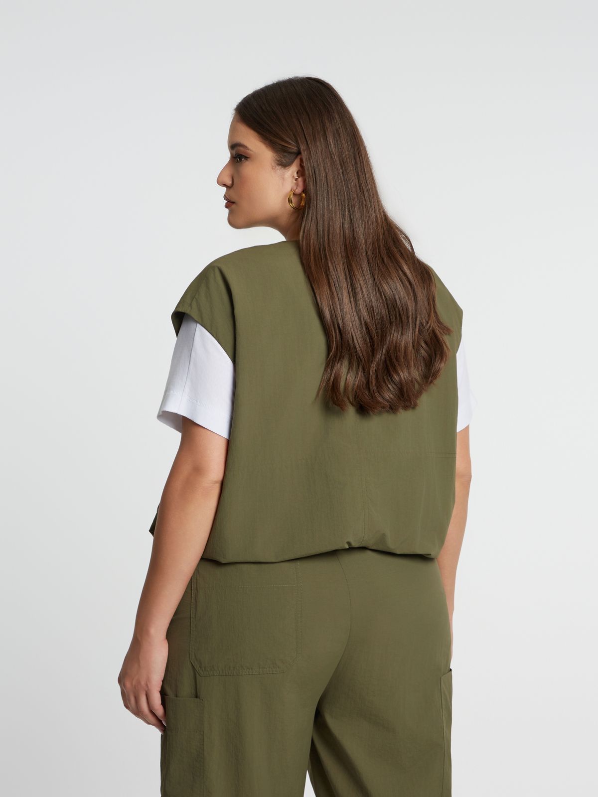 Technical zip-up vest with utility pocket details