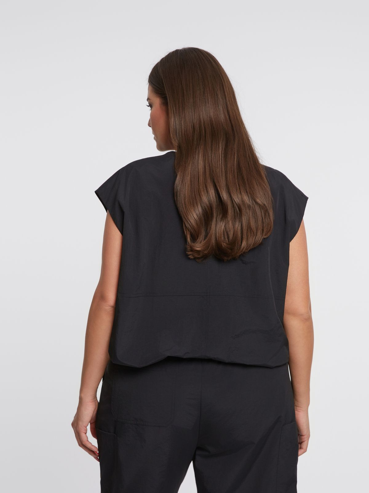 Technical zip-up vest with utility pocket details
