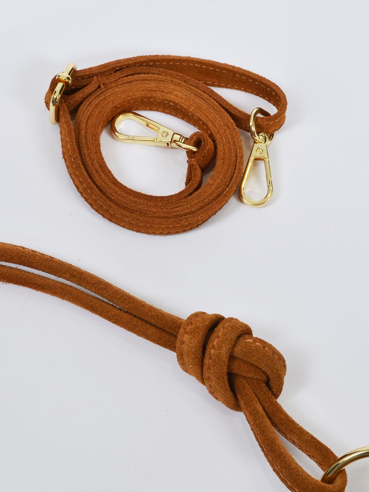 Suede leather shoulder bag with knotted handles
