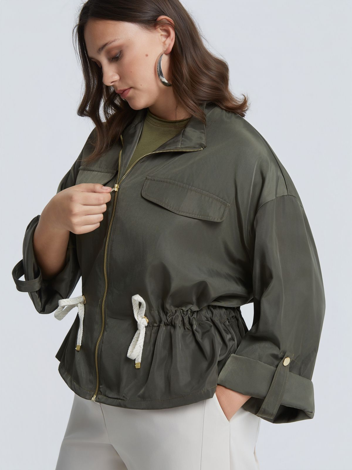 Utility jacket with drawstring waist
