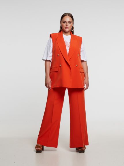 Double-breasted sleeveless blazer with structured lapels