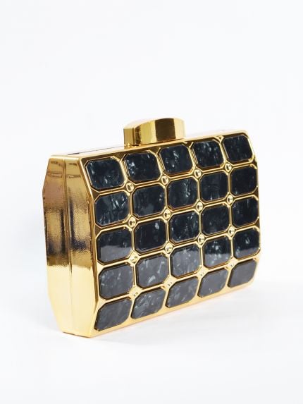 Geometric hard case clutch with marbled tile pattern and gold-tone frame