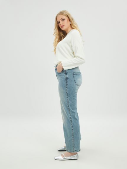 Τζιν wide-leg ανοιχτό μπλε με μεταλλικά στοιχεία
