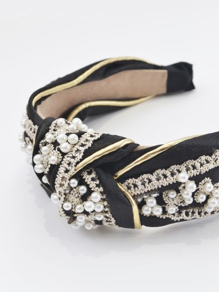 Knotted black and gold headband with pearl embellishments