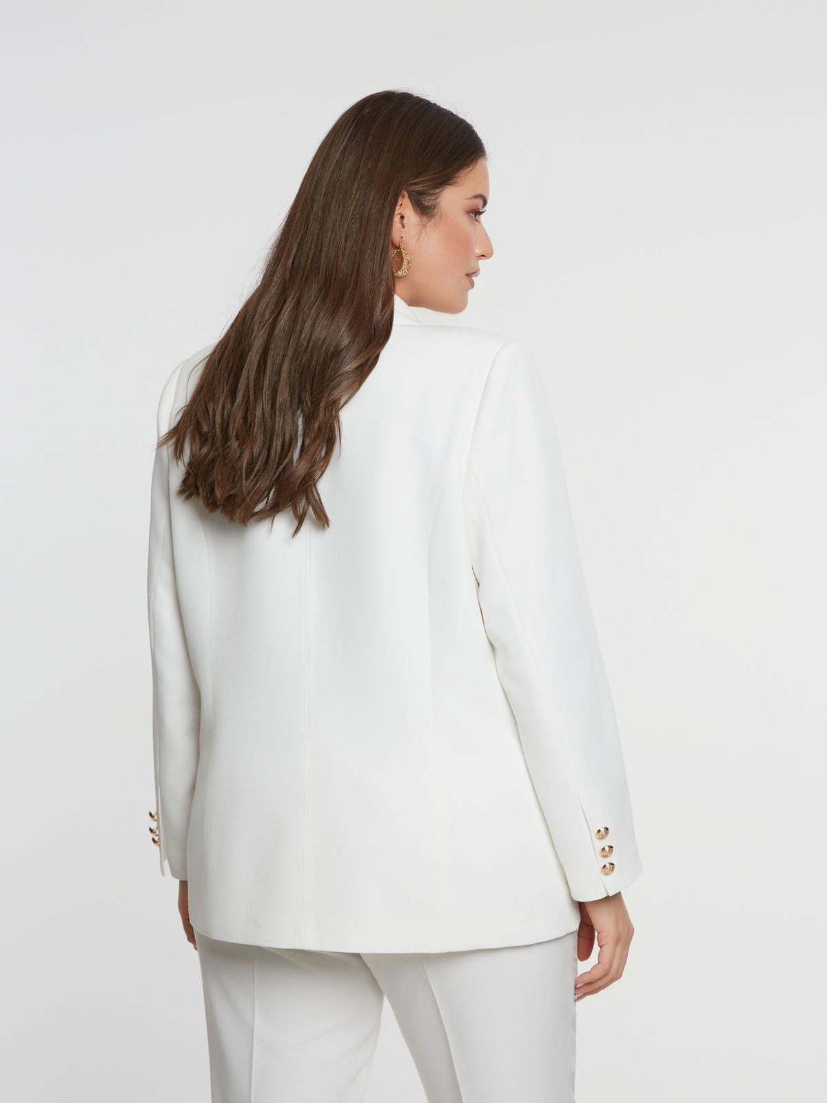 Σταυρωτό σακάκι με χρυσά κουμπιά φωτογραφία