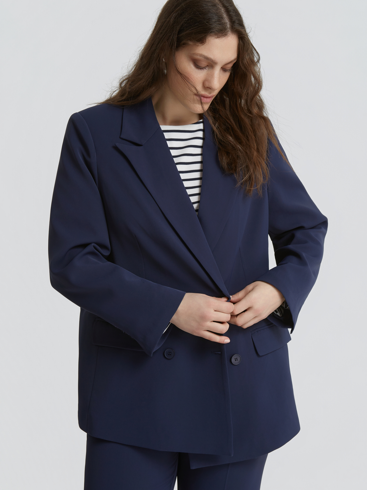 Σταυρωτό σακάκι φωτογραφία