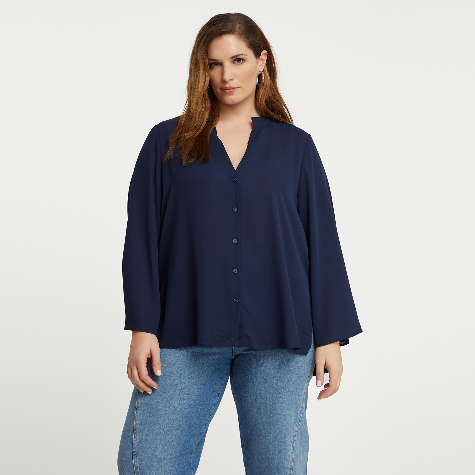 Fluid shirt with sculptural sleeves