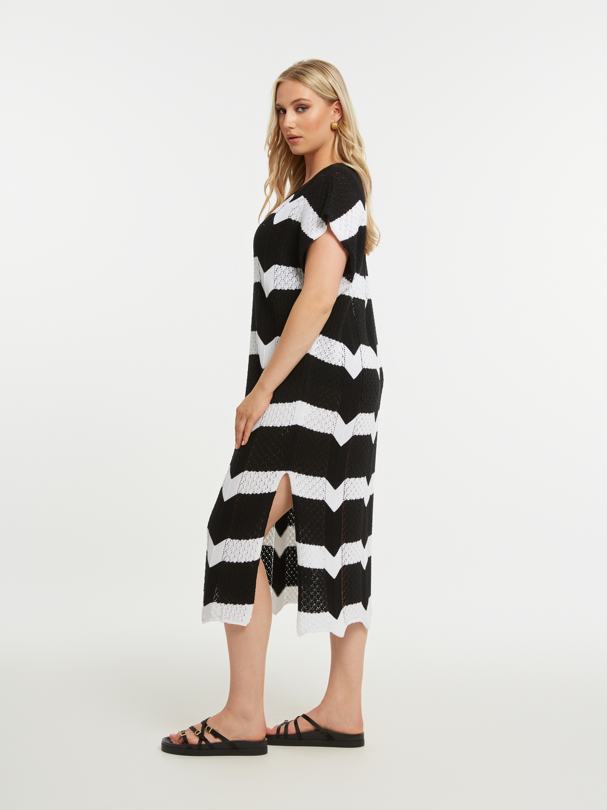 Πλεκτό midi φόρεμα με ρίγες φωτογραφία