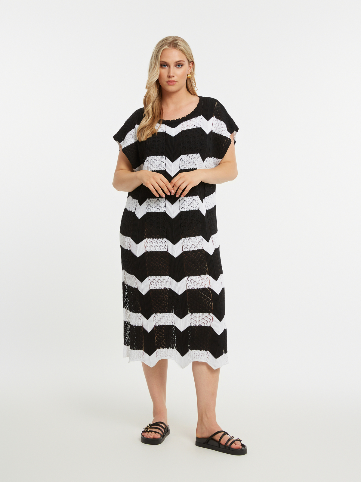 Πλεκτό midi φόρεμα με ρίγες φωτογραφία