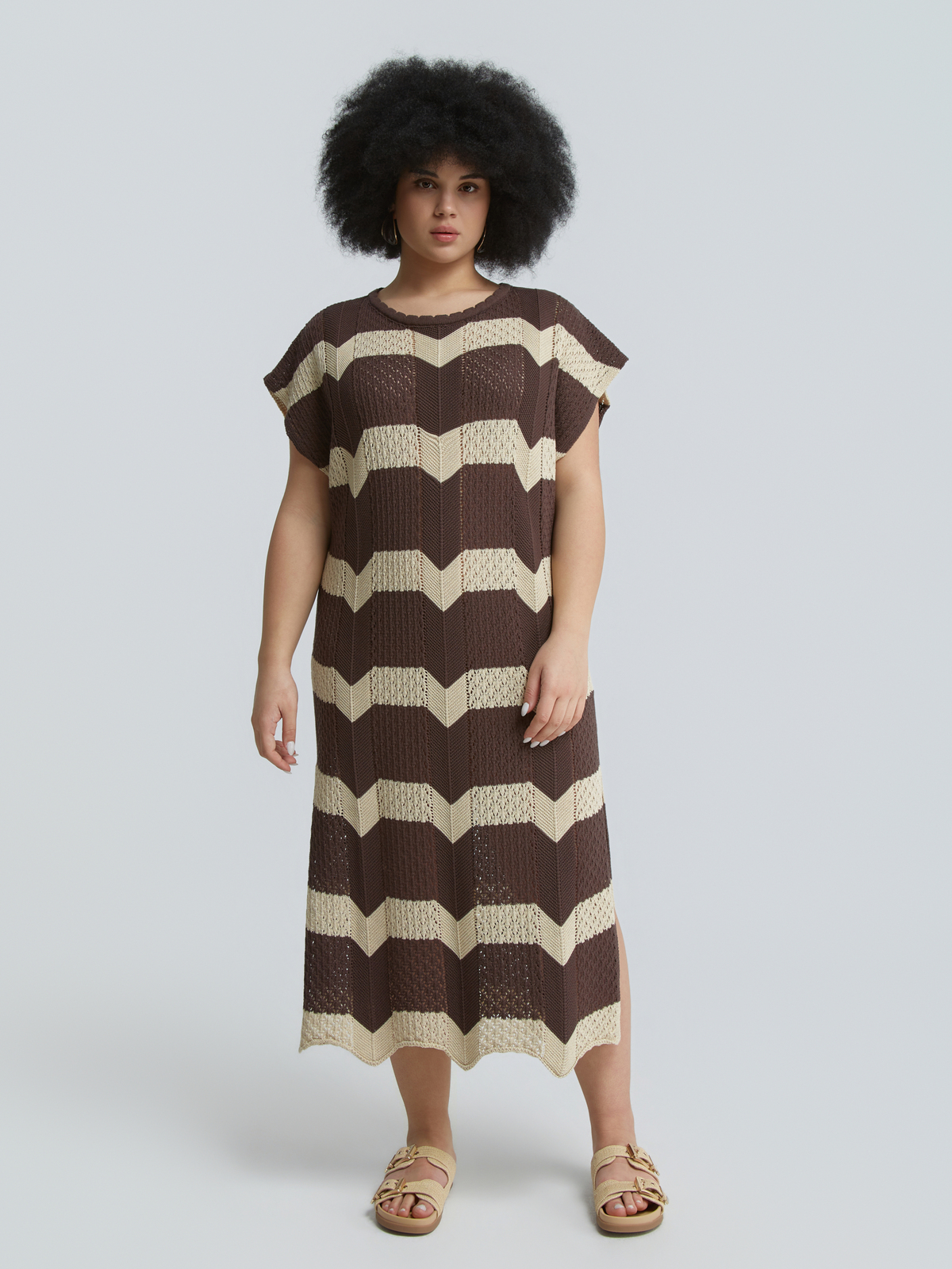 Πλεκτό midi φόρεμα με ρίγες φωτογραφία