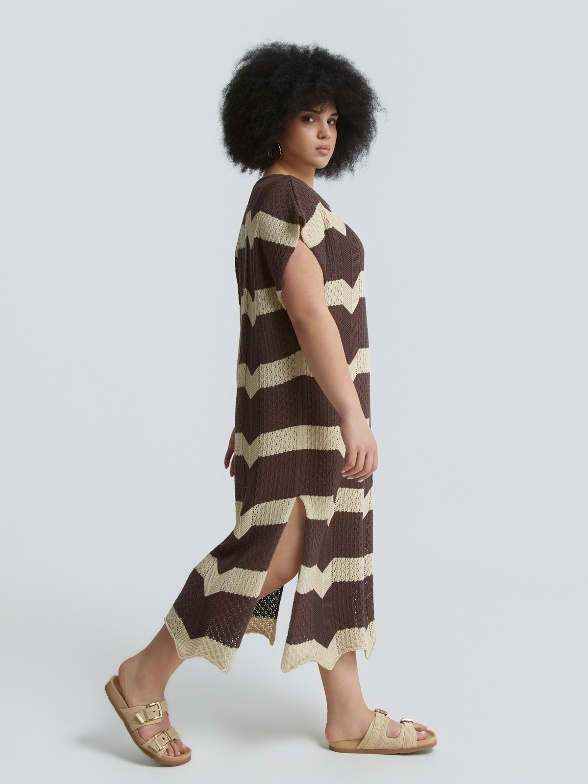 Πλεκτό midi φόρεμα με ρίγες φωτογραφία