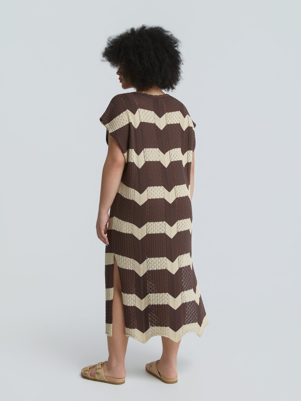 Πλεκτό midi φόρεμα με ρίγες φωτογραφία