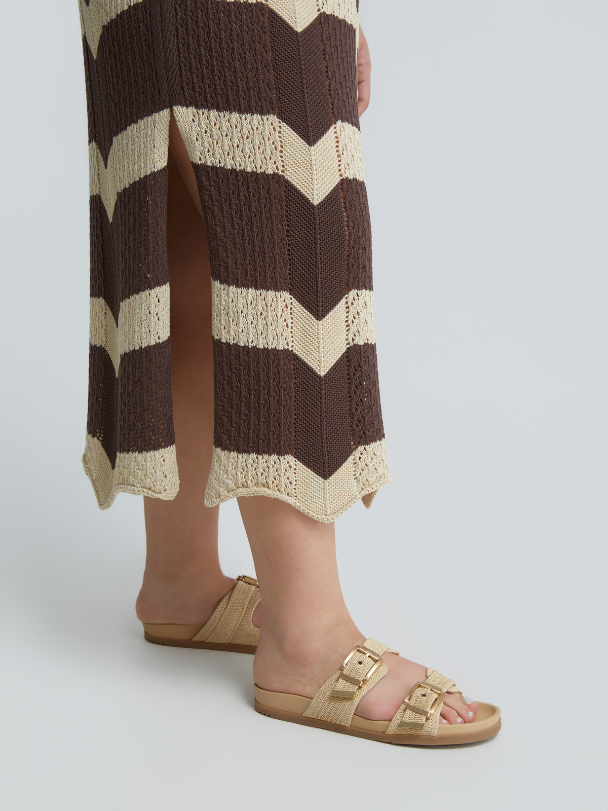 Πλεκτό midi φόρεμα με ρίγες φωτογραφία