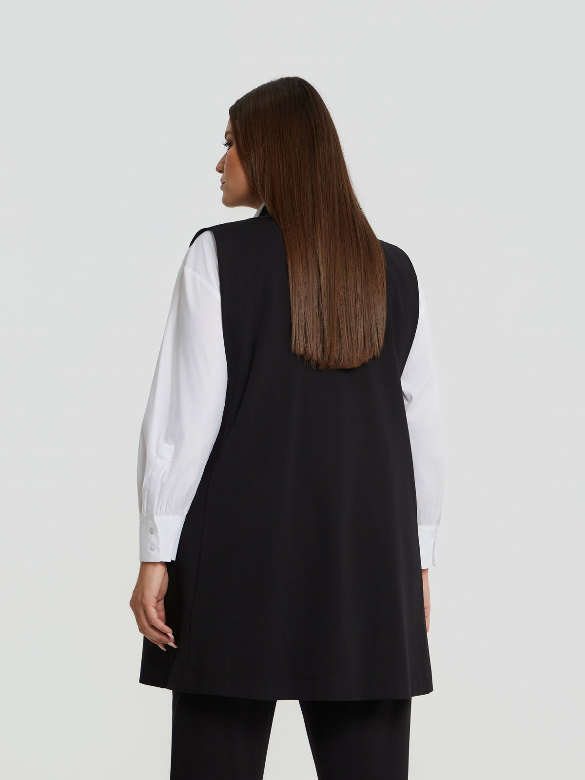 Μακρύ γιλέκο με ρέλι σε αντίθεση φωτογραφία