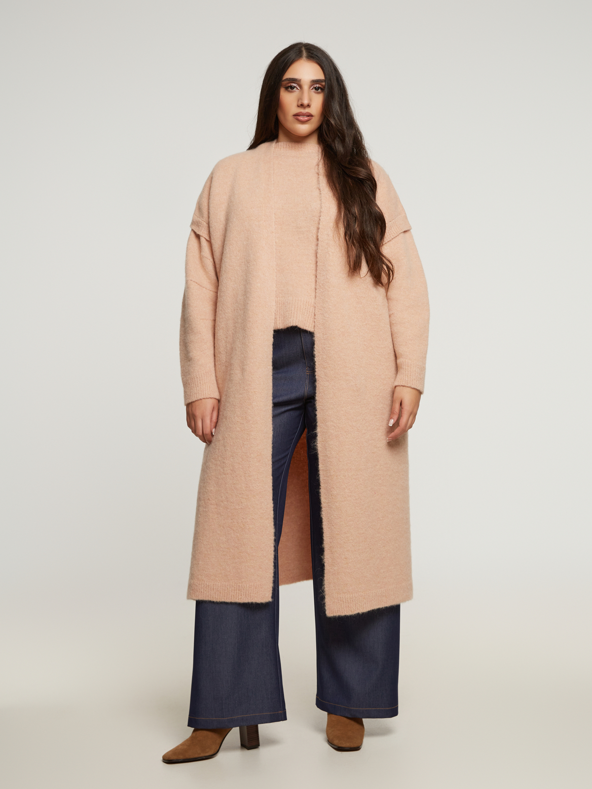 Κοντομάνικο μακρύ πλεκτό γιλέκο φωτογραφία