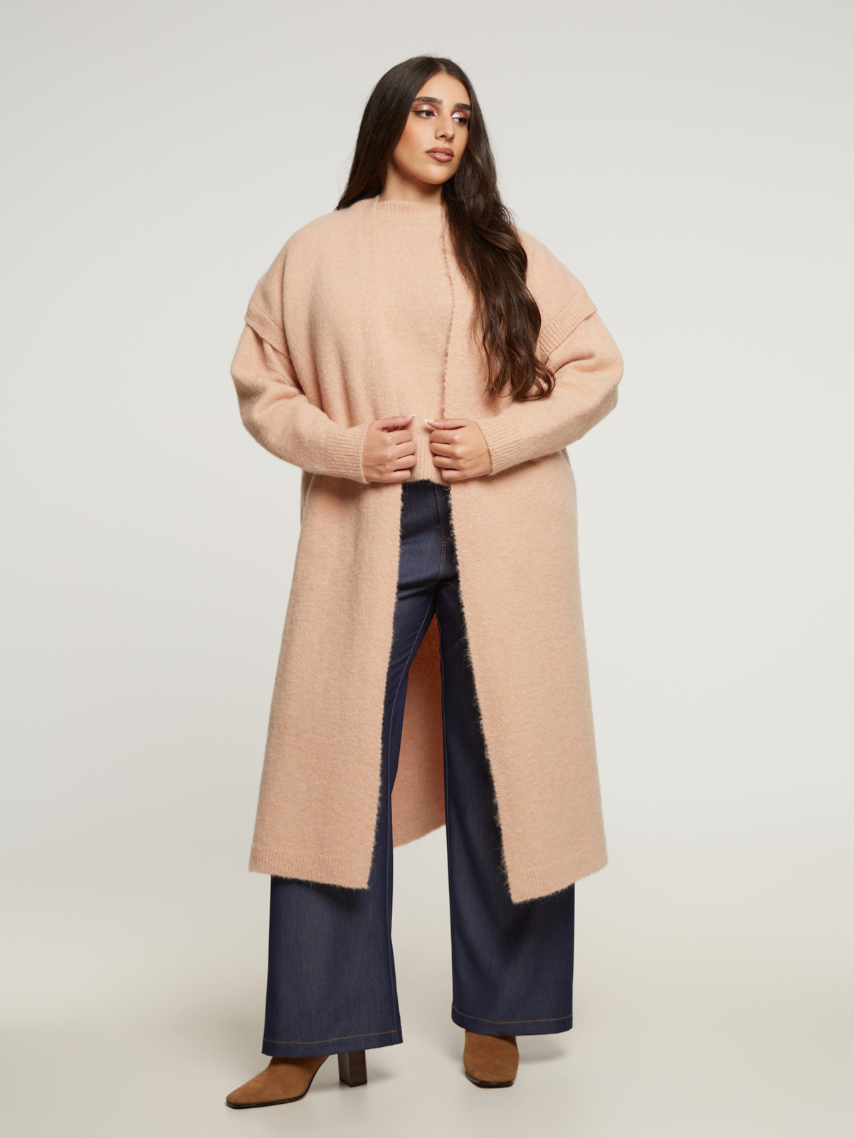 Κοντομάνικο μακρύ πλεκτό γιλέκο φωτογραφία