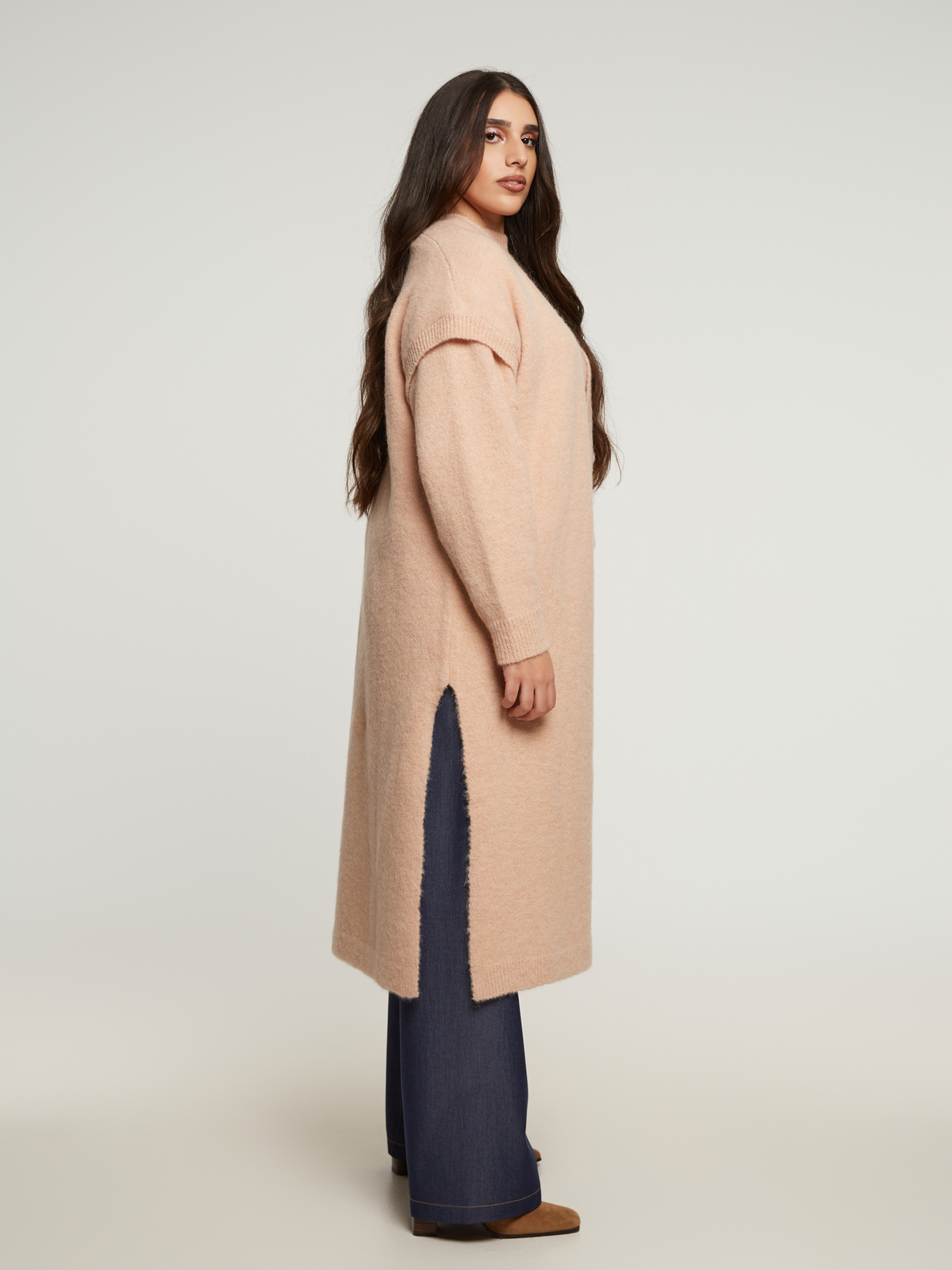 Κοντομάνικο μακρύ πλεκτό γιλέκο φωτογραφία