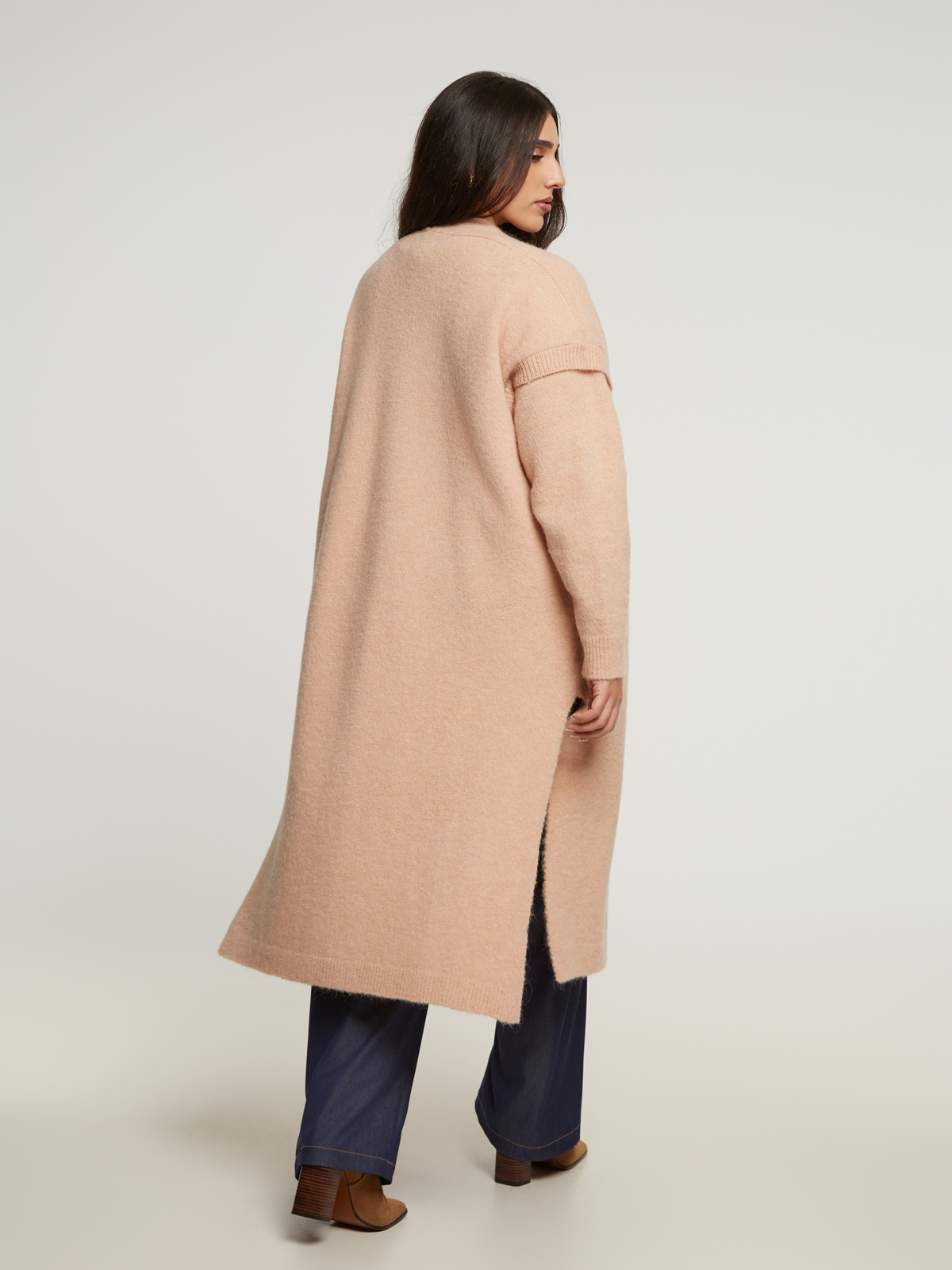 Κοντομάνικο μακρύ πλεκτό γιλέκο φωτογραφία