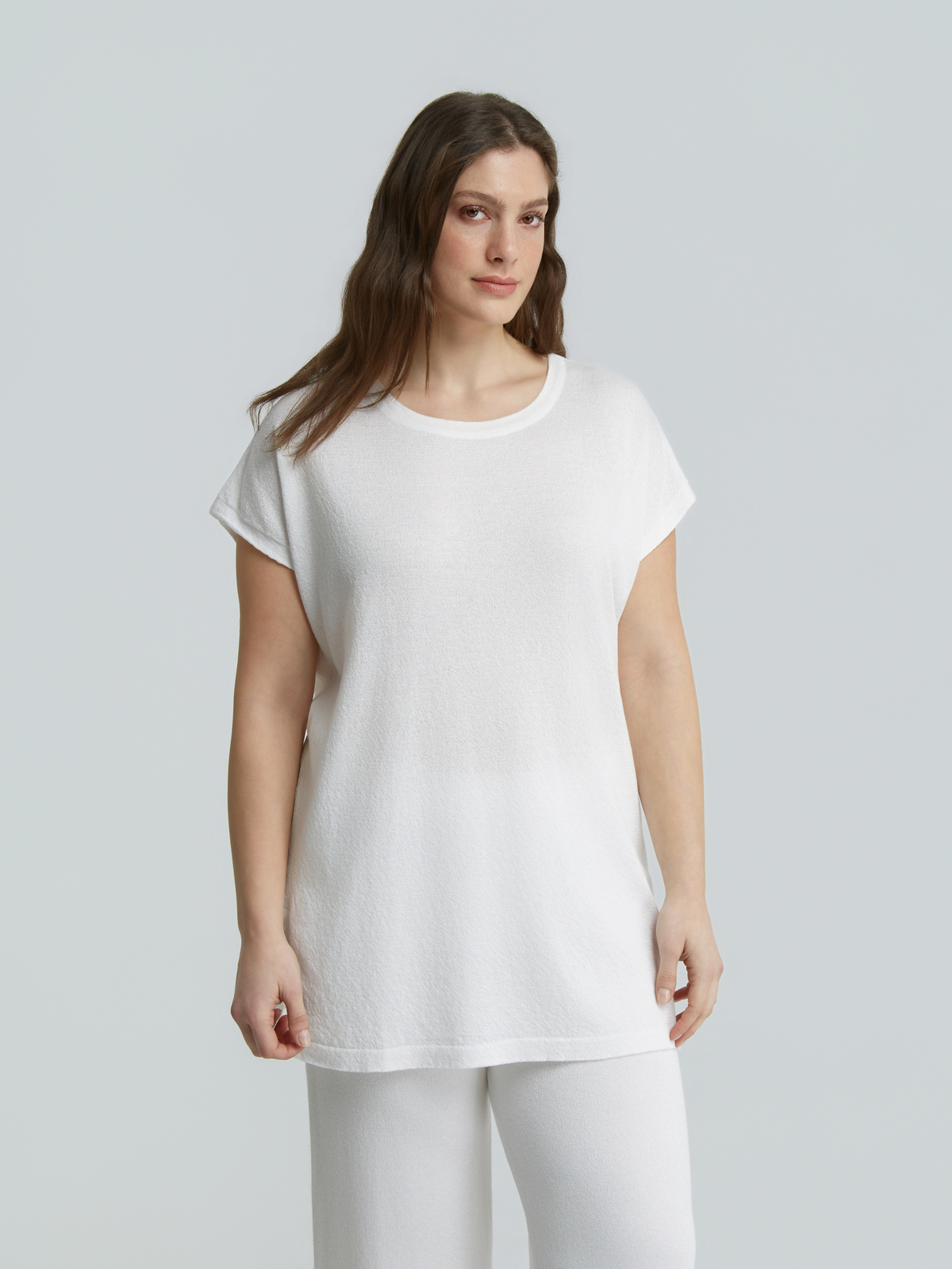 Πλεκτό longline τοπ με lurex φωτογραφία