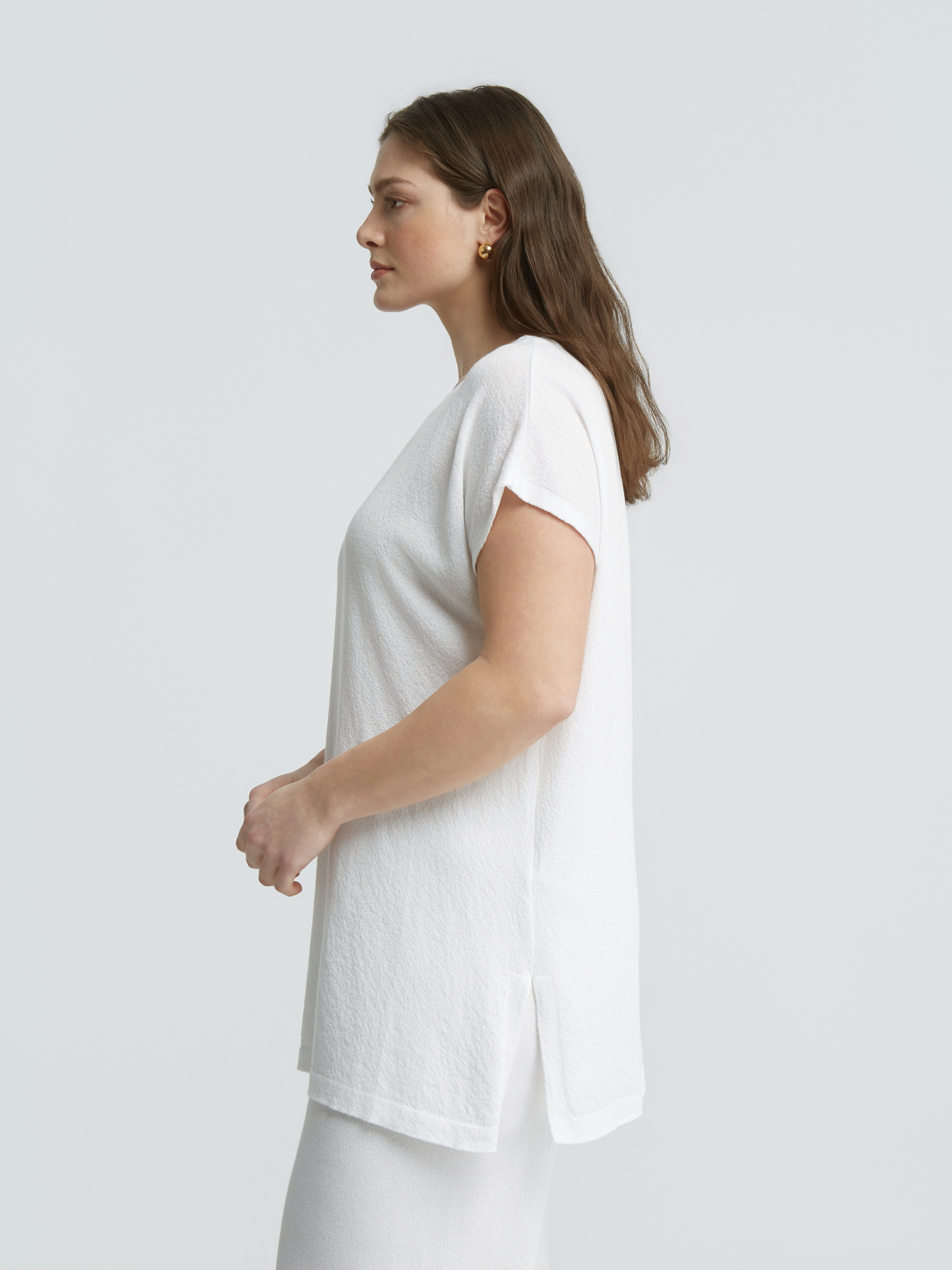 Πλεκτό longline τοπ με lurex φωτογραφία