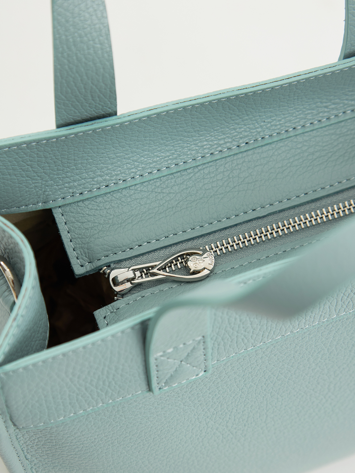 Δερμάτινη τσάντα με τσέπη φωτογραφία