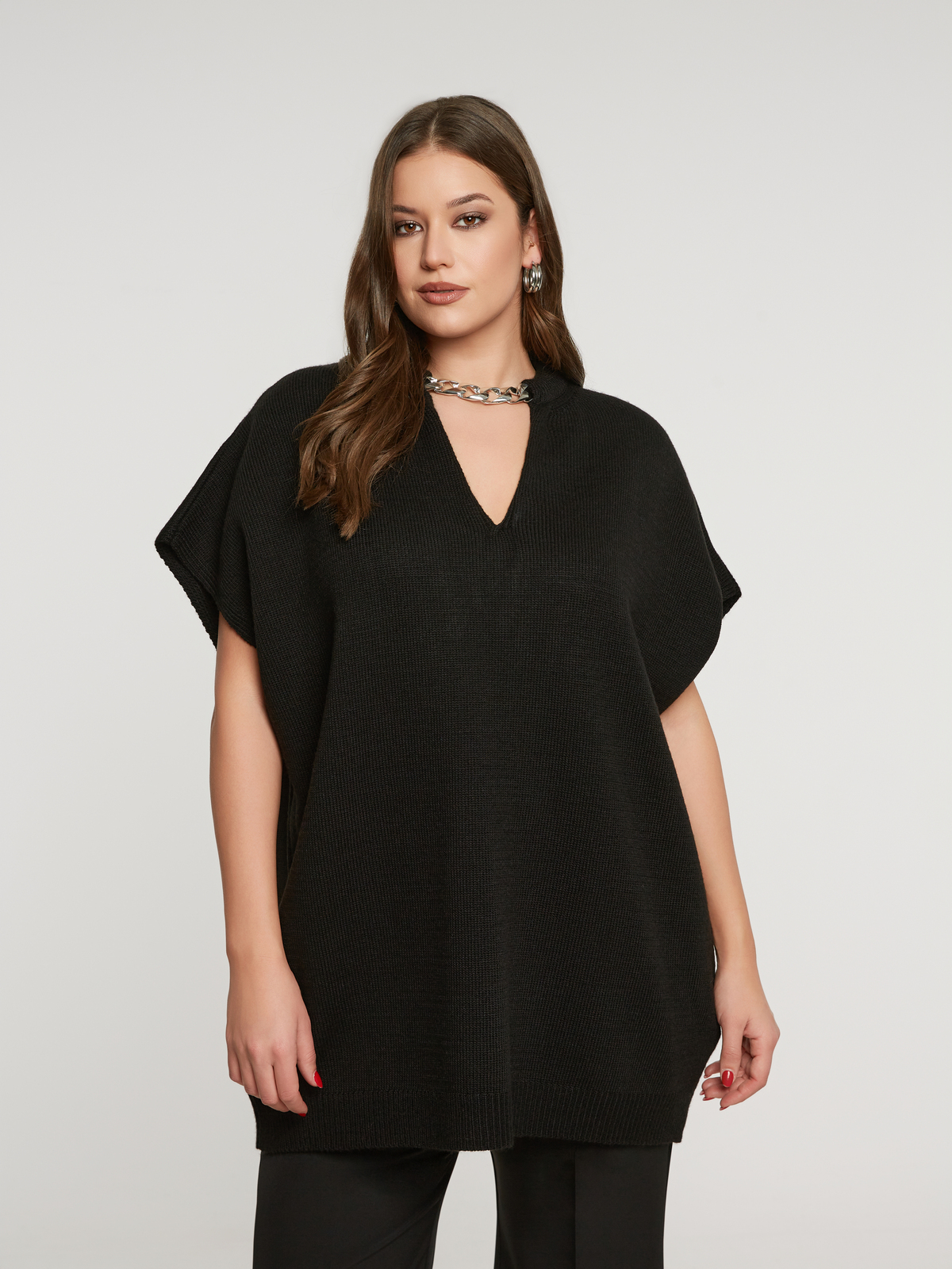 Μακριά πλεκτή τουνίκ με αποσπώμενη αλυσίδα φωτογραφία