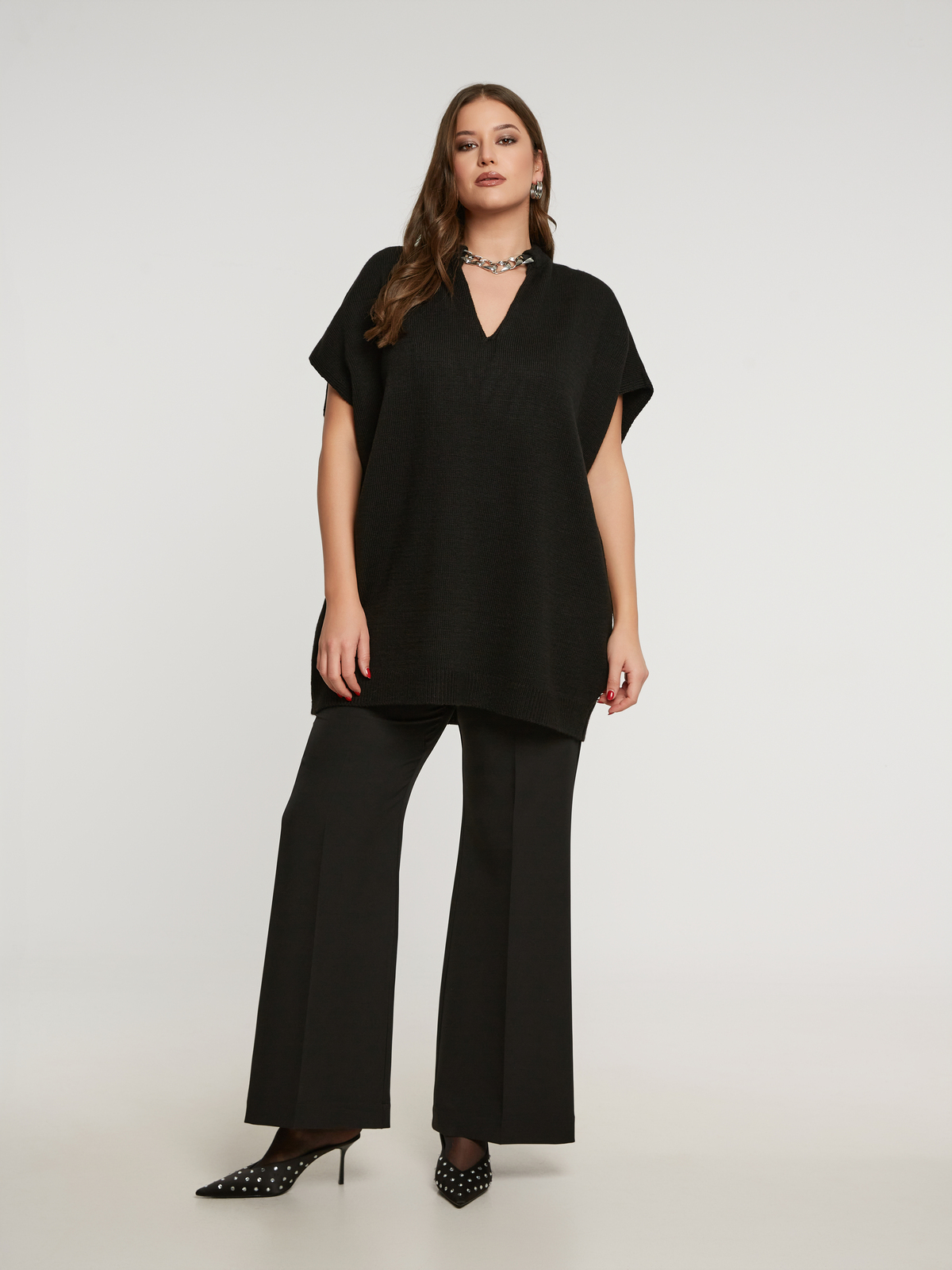 Μακριά πλεκτή τουνίκ με αποσπώμενη αλυσίδα φωτογραφία