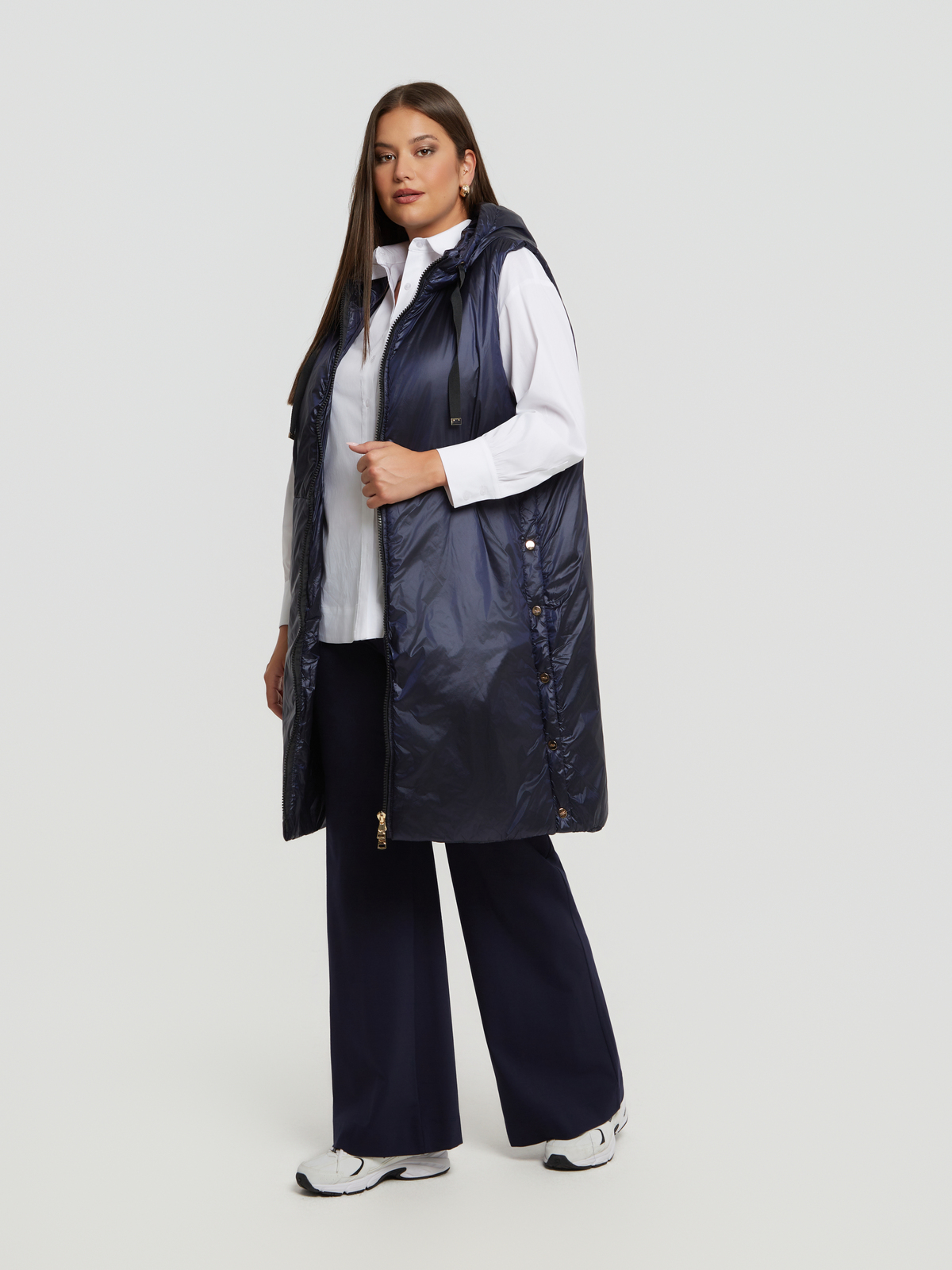 Μακρύ αμάνικο puffer γιλέκο με κουκούλα φωτογραφία