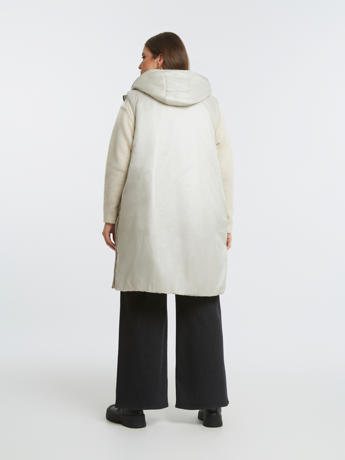 Μακρύ αμάνικο puffer γιλέκο με κουκούλα φωτογραφία