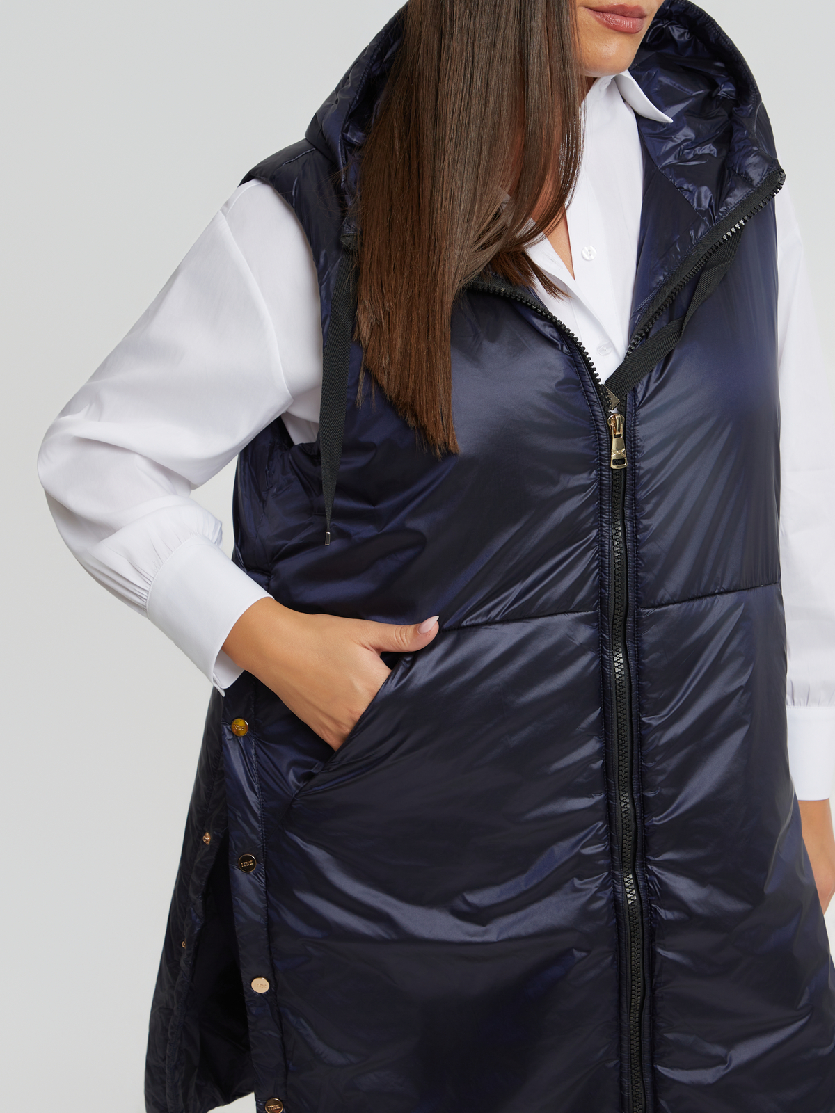 Μακρύ αμάνικο puffer γιλέκο με κουκούλα φωτογραφία