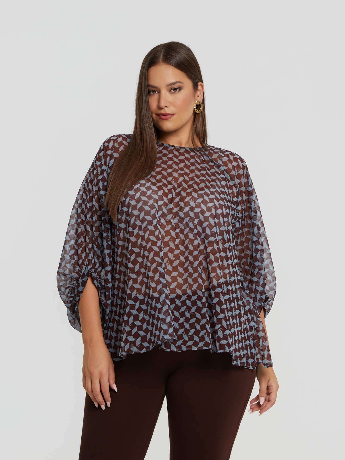 Διαφανής μπλούζα με γεωμετρικό σχέδιο & μπαλούν μανίκια φωτογραφία