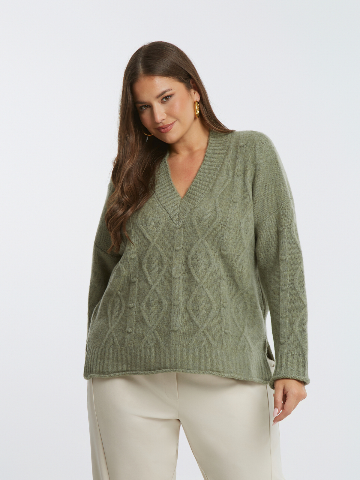 Πλεκτή μπλούζα με V με μοτίβο κοτσίδα φωτογραφία