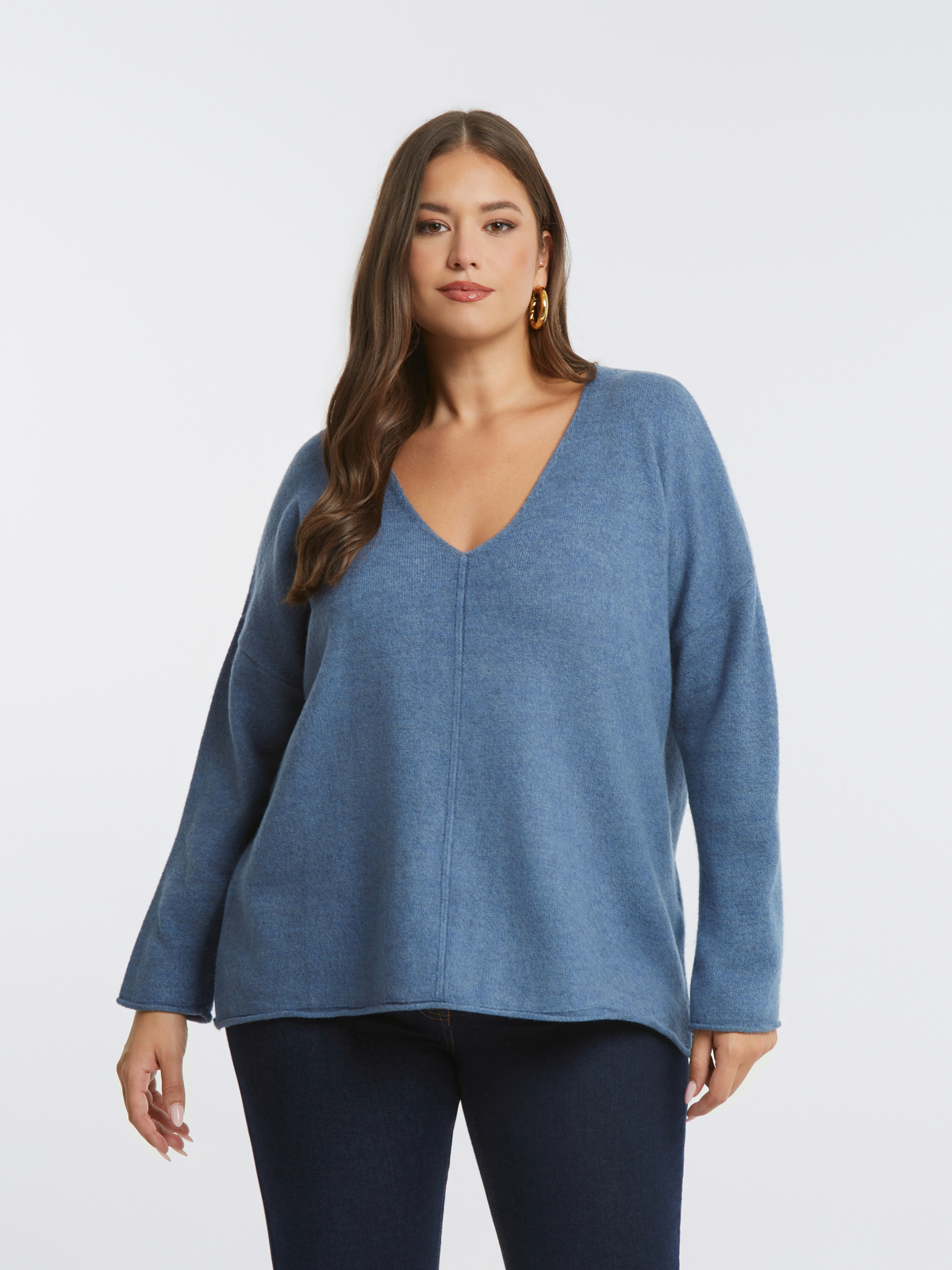 Πλεκτή μπλούζα με V-λαιμόκοψη και χαλαρή γραμμή φωτογραφία