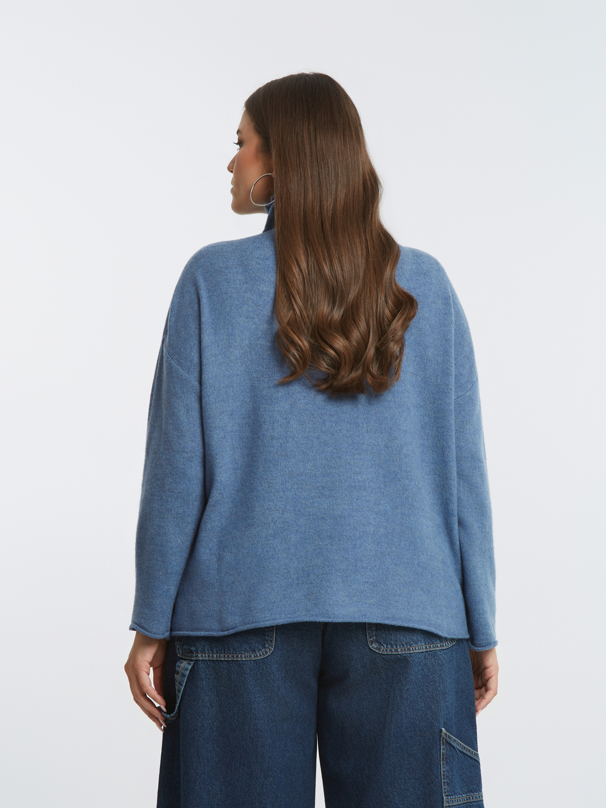 Πλεκτή μπλούζα ζιβάγκο σε χαλαρή γραμμή φωτογραφία