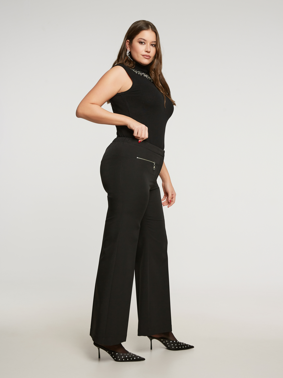 Μαύρο παντελόνι καμπάνα με φερμουάρ στα πλαϊνά φωτογραφία
