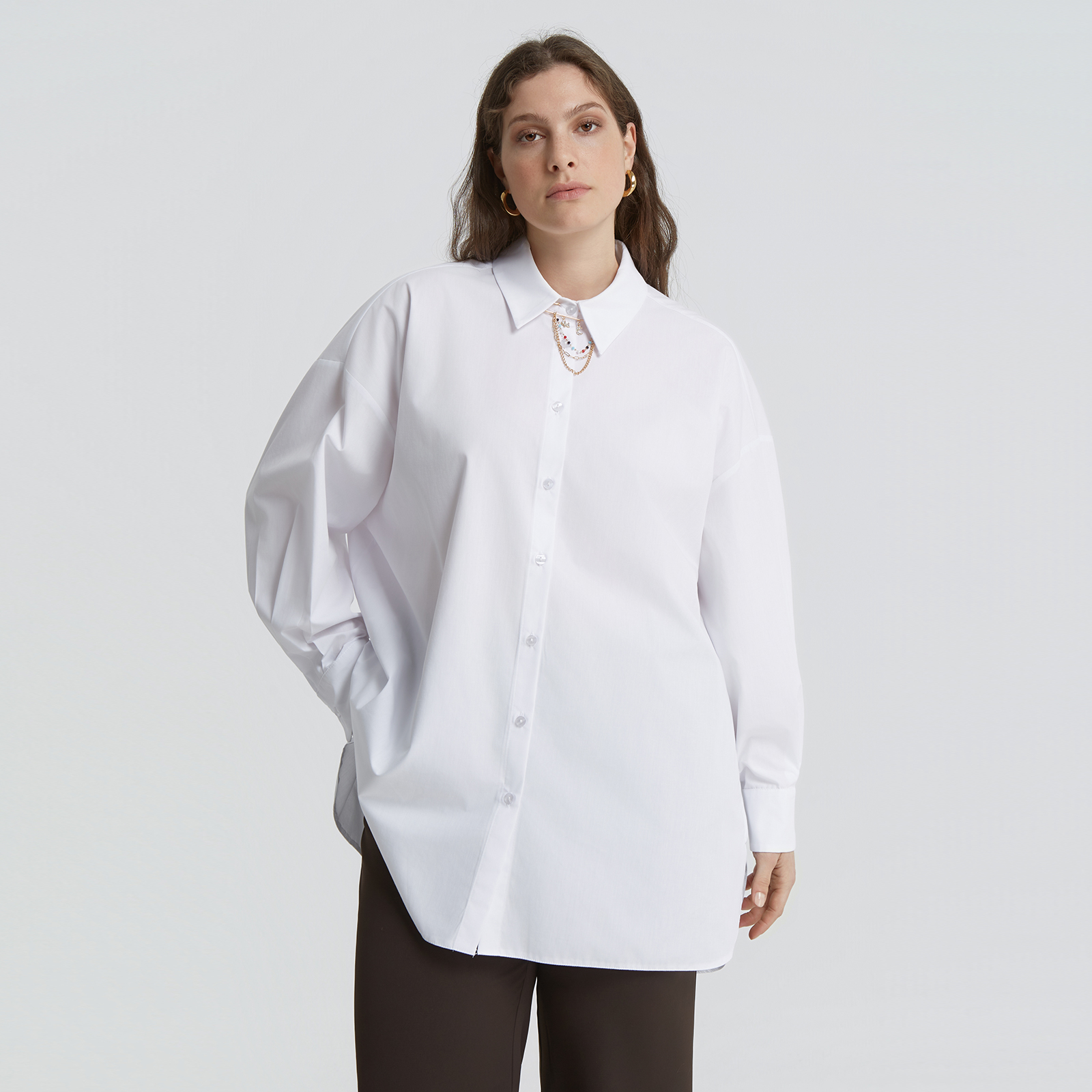 White shirt with decorative chain detail