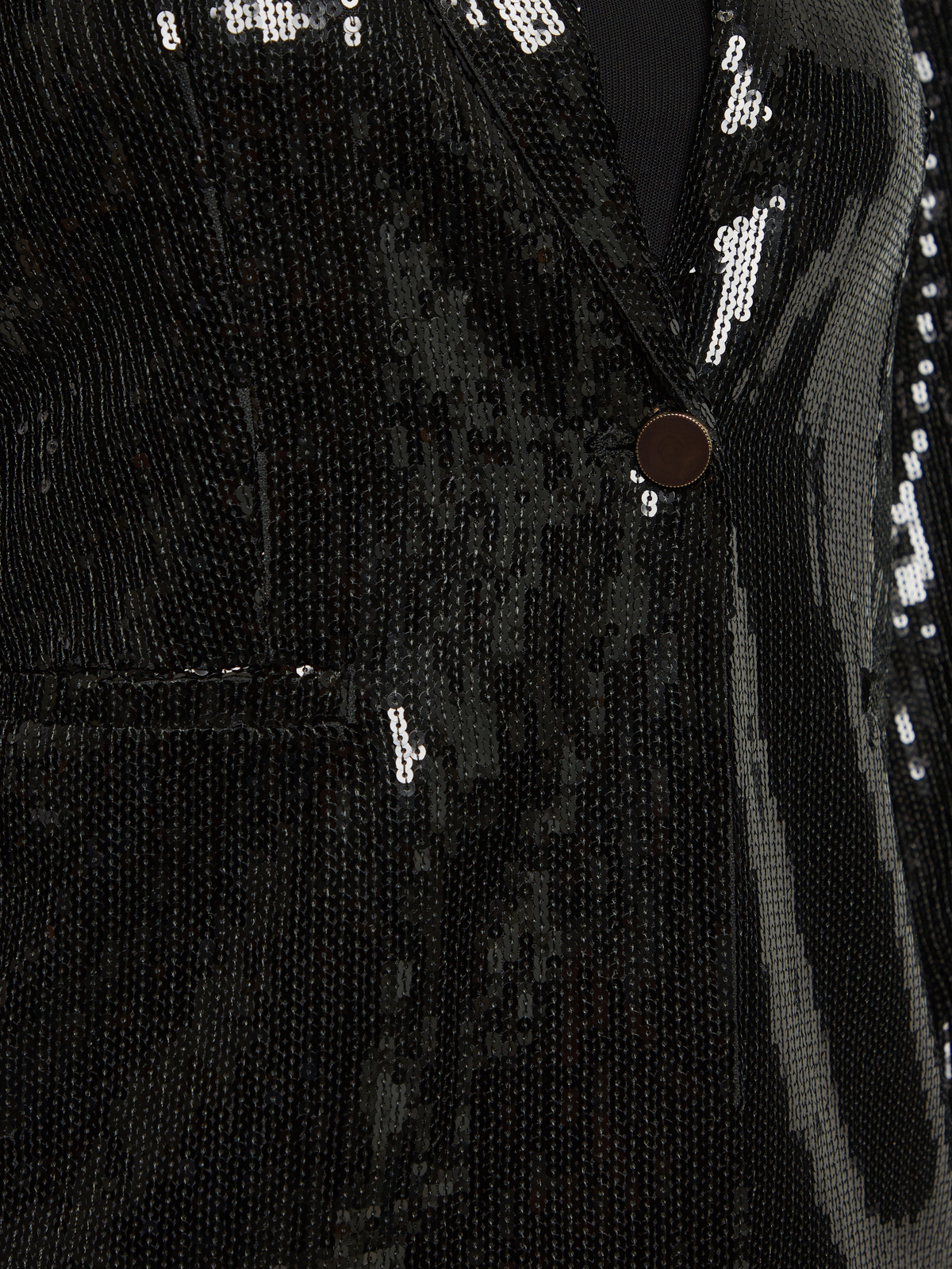 Σακάκι με παγιέτες και κούμπωμα φωτογραφία