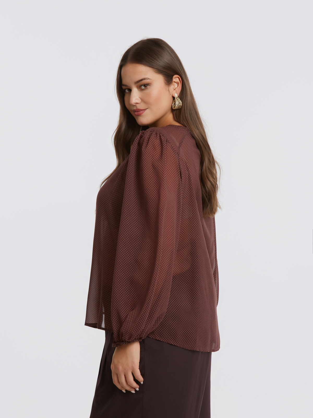 Αέρινη μπλούζα με πουά σχέδιο και μπαλούν μανίκια φωτογραφία