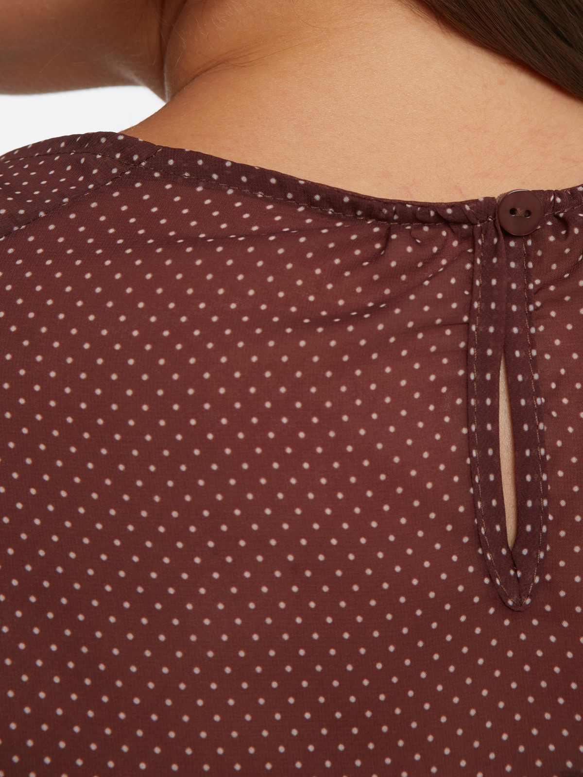 Αέρινη μπλούζα με πουά σχέδιο και μπαλούν μανίκια φωτογραφία